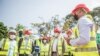 Une délégation conduite par le président du musée "Quai Branly-Jacques Chirac" Emmanuel Kasarherou visite le chantier d'un futur musée à Ouidah, le 26 mars 2021.