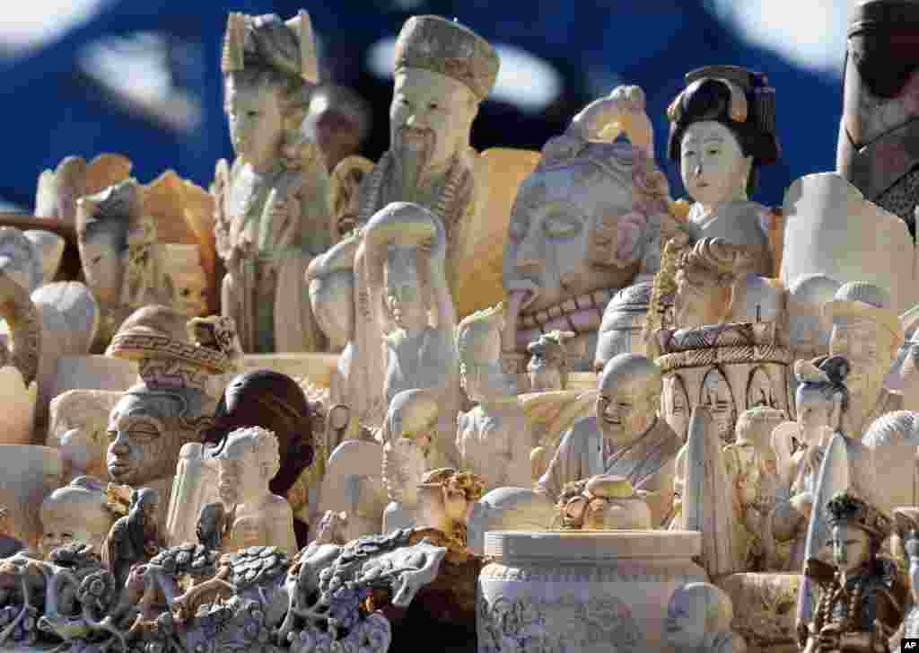 Confiscated decorative ivory is piled together in preparation to be destroyed during an event at the National Wildlife Property Repository, at Rocky Mountain Arsenal National Wildlife Refuge, in Commerce City, Colo., Nov. 14, 2013.