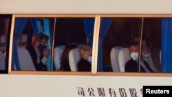 A vehicle with U.S. Special Presidential Envoy for Climate John Kerry on board arrives at a state guest hotel during his visit, in Shanghai, China, April 14, 2021.