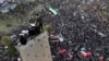 Syrians continue to celebrate the ousting of Bashar al-Assad's government, at Umayyad Square, in Damascus, Syria, Dec. 20, 2024. 
