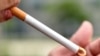 Arhiva - Žena pali cigaretu