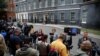 Members of the media wait outside 10 Downing Street, where British Prime Minister Boris Johnson is expected to make a statement, in London, July 7, 2022. 