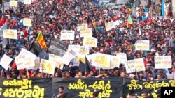 Students shout anti-government slogans during a protest march in Colombo, Sri Lanka, July 8, 2022.