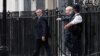 Perdana Menteri Inggris Boris Johnson berjalan keluar Downing Street di London, Inggris, pada 5 Juli 2022. (Foto: Reuters/Peter Nicholls)