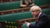 Britain’s Johnson Asks Lawmakers to Back a Tougher Lockdown