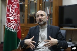 FILE - Afghan National Security Adviser Haneef Atmar speaks during an interview in Kabul, Afghanistan, Oct. 24, 2015. Atmar's spokesman has called Russia “an important political ally” of Afghanistan.