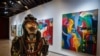 A sculpture by Cameroonian artist Joseph-Francis Sumégné titled “Mon portrait sur ton visage” is displayed at Dakar's Museum of Black Civilizations. (Photo: A. Hammerschlag/VOA)