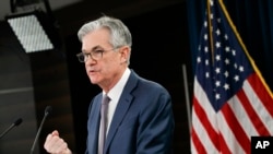 FILE - Federal Reserve Chair Jerome Powell speaks during a news conference, Tuesday, March 3, 2020, to discuss an announcement from the Federal Open Market Committee, in Washington.
