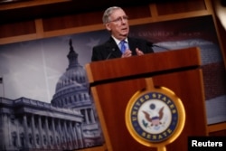 FILE - Senate Majority Leader Mitch McConnell, R-Ky., speaks with reporters at the Capitol in Washington, April 7, 2017.