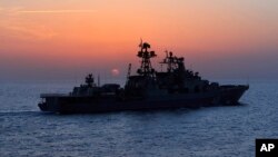 FILE - The Russian navy destroyer Vice Admiral Kulakov is seen on patrol in the eastern Mediterranean, Jan. 21, 2016. The Russian Defense Ministry says two Russian navy destroyers, the Kulakov and the Severomorsk, drove away a Dutch submarine.