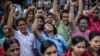 FILES - Members of the Bangladeshi Hindu community chant slogans against violence reportedly targeting the country's minorities during a protest in Dhaka on Aug. 9, 2024, days after a student-led uprising ended the 15-year rule of Sheikh Hasina.