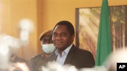 FILE - Zambia's then-president-elect Hakainde Hichilema addresses a press conference at his residence in Lusaka, Zambia, Aug, 16, 2021. An opposition leader has been arrested after criticizing Hichilema's media director on Facebook.