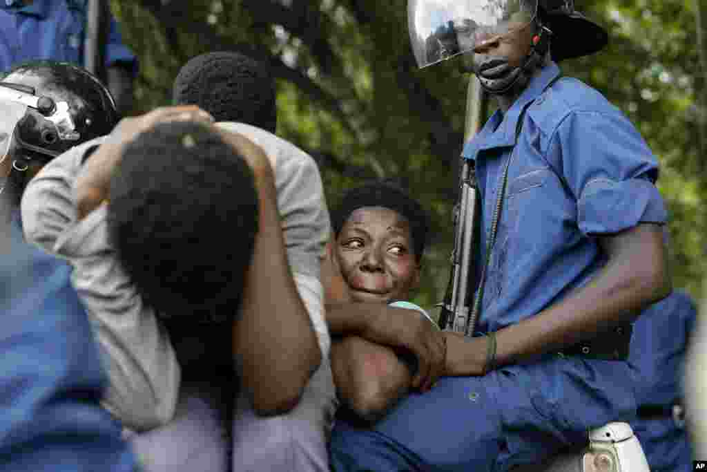 Demonstrators are detained by police during clashes in the Musaga district of Bujumbura, May 4, 2015. 