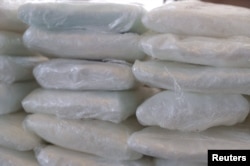 Packets of fentanyl mostly in powder form and methamphetamine, which U.S. Customs and Border Protection say they seized from a truck crossing into Arizona from Mexico, is on display during a news conference at the Port of Nogales, Arizona, Jan. 31, 2019.