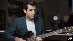 Mark Ronson poses for a photo at Jeff Bhasker Studio, in Venice, California.