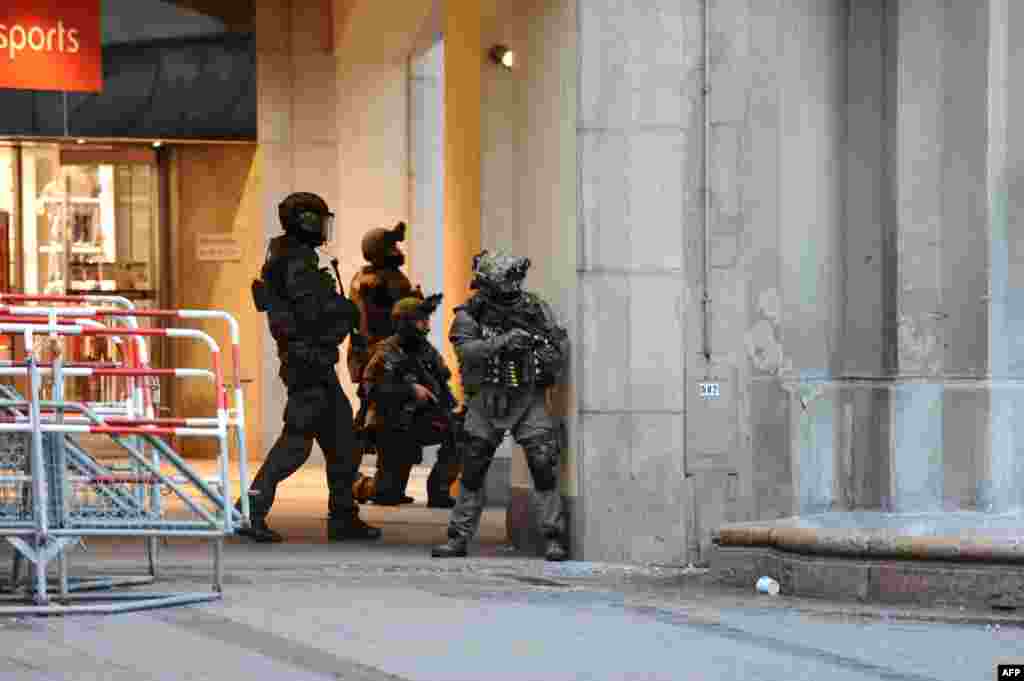 Police secures the area of a subway station Karlsplatz (Stachus) near a shopping mall following a shooting in Munich, Germany.&nbsp;Several people were killed in a shooting rampage by a lone gunman in a Munich shopping center, media report.&nbsp;