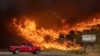 Vatrogasno vozilo u blizini požara kod jezera Castaic, 22 januar 2025. (Foto: Apu Gomes/AFP)