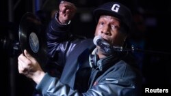 FILE - Hip-hop DJ Grandmaster Flash speaks at a ceremony where he is inducted into Guitar Center's RockWalk in Los Angeles, March 6, 2014.