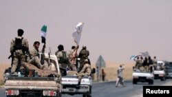 Forces démocratiques syriennes (FDS) sont entrées mardi dans le quartier de Mechleb, dans l'est de la ville, 6 juin 2017.