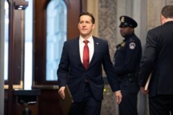 FILE - Sen. Ben Sasse, R-Neb., arrives on Capitol Hill in Washington, Jan. 31, 2020.