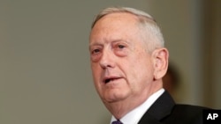 FILE - Defense Secretary Jim Mattis answers a reporter's question about North Korea, before a meeting with Dutch Defense Minister Jeanine Hennis-Plasschaert at the Pentagon, Aug. 15, 2017.