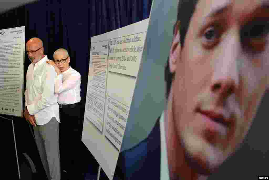 Victor Yelchin and Irina Yelchina, parents of Star Trek actor Anton Yelchin, who died when he was pinned by a rollaway Jeep Grand Cherokee in the driveway of his Studio City home, stand near a portrait of their late son during a news conference in Los Angeles, California, August 2, 2016.