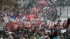 People march during a protest against Russia's new law banning Americans from adopting Russian children in Moscow, January 13, 2013. 