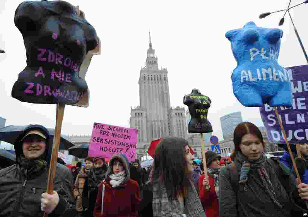 Protesters march demanding greater accessibility of abortion but also for better work conditions and more state support in raising children, in Warsaw, Poland, March 6, 2016.