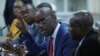 Haiti's Minister of Planning and External Cooperation Aviol Fleurant gestures as he speaks during a news conference about the resolution on the Oxfam scandal in Port-au-Prince, Haiti, June 13, 2018. 