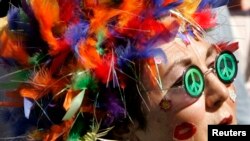 A fan listens to music during the "Summer of Love" 40th anniversary concert at Golden Gate Park in San Francisco, California, September 2, 2007. 