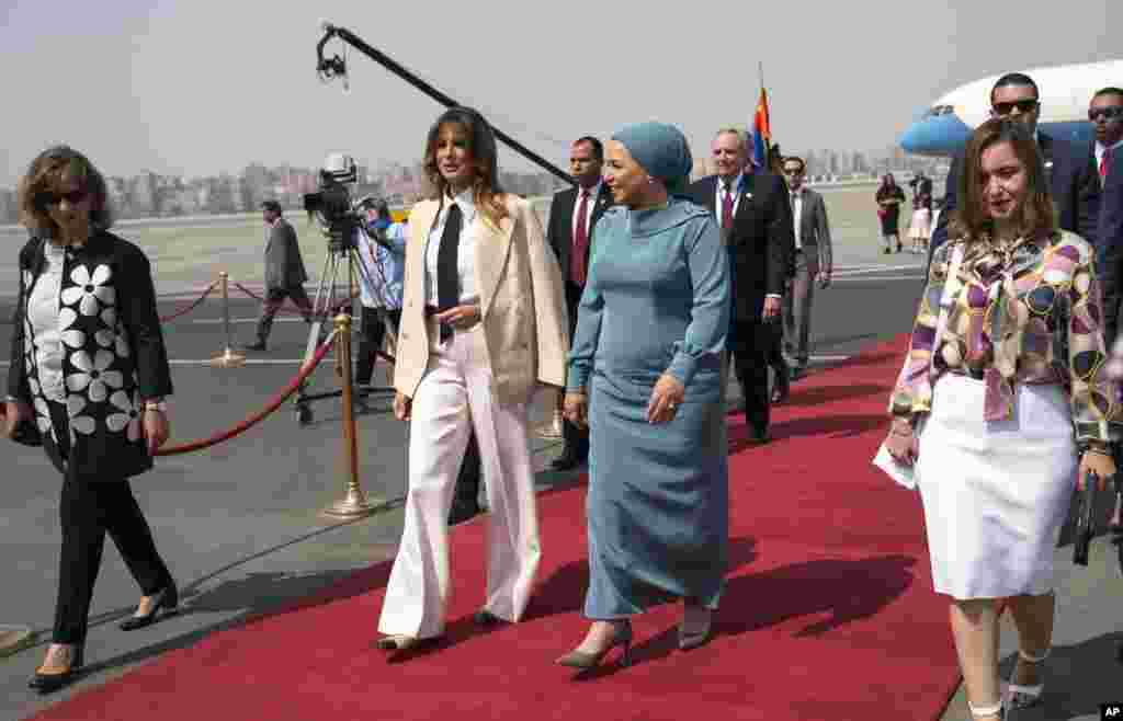 First Lady Melania Trump is greeted by Egyptian First Lady Entissar Mohameed Amer as she arrives at Cairo International Airport in Cairo, Oct. 6, 2018.