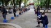 Vietnam Latest to Lock Down, While US Braces for Huge Death Toll