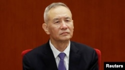 Chinese Vice Premier Liu He attends an event marking the 40th anniversary of China's reform and opening up at the Great Hall of the People in Beijing, Dec. 18, 2018.
