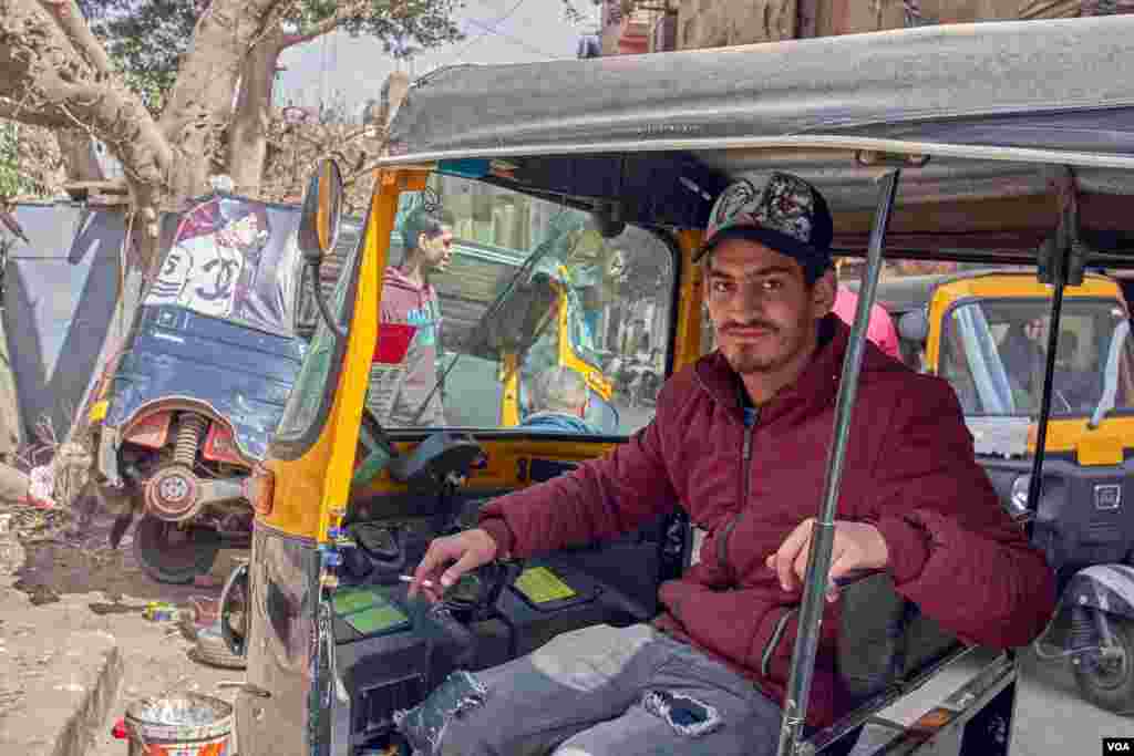 Tarek ElSoury, a 22-year-old, says "The toktok costs too much money for taking care and fixing. Moreover, when the police arrest any of us on the highway, the penalty fees would range from 80LE up to 10,000LE." (H. Elrasam/VOA)