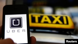 “Uber” adalah jaringan taksi internasional yang berkantor di Amerika, yang juga beroperasi di New Delhi, India (foto: dok).