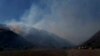 Thousands evacuate as Northern California wildfire spreads, more hot weather expected