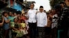 Presiden Joko Widodo dan Ma'ruf Amin setelah mendeklarasikan kemenangan pilpres 2019 di Jakarta, Selasa, 21 Mei 2019. (Foto: Reuters)