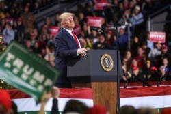 Trump akiwa katika kampeni huko Michigan.