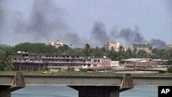 Crise ivoirienne : les combats gagnent Abidjan
