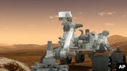 FILE - Curiosity rover on the surface of Mars, Dec. 4, 2012.