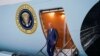 Presiden AS Joe Biden turun dari Air Force One setibanya di pangkalan udara RAF Aldergrove di County Antrim, Irlandia Utara, 11 April 2023. (REUTERS/Kevin Lamarque)