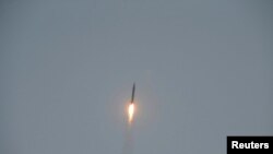 FILE - A tactical rocket lifts off during a firing drill of the KPA Strategic Force in this undated photo released by North Korea's Korean Central News Agency.