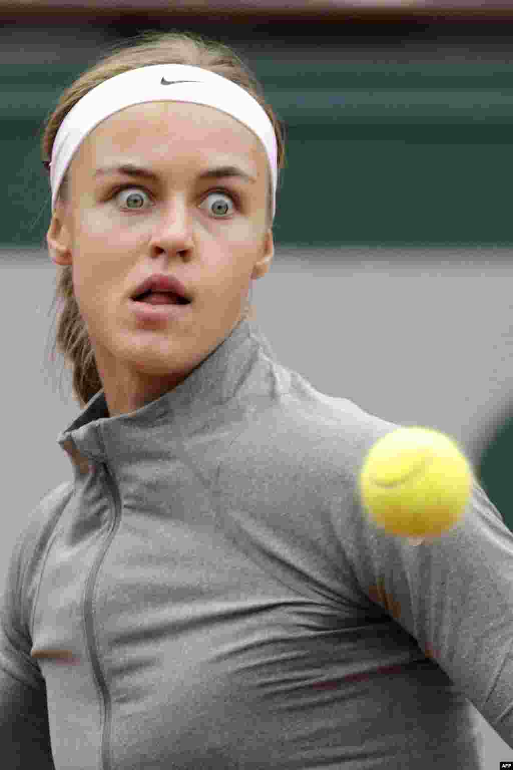 Slovakia's Anna Schmiedlova returns the ball to USA's Venus Williams during the French tennis Open second round match at the Roland Garros stadium in Paris, France.