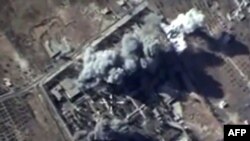 A video grab made on October 12, 2015, shows an image taken from footage made available on the Russian Defense Ministry's website, purporting to show explosions after airstrikes carried out by Russian jets on what Moscow says was an Islamic State target.