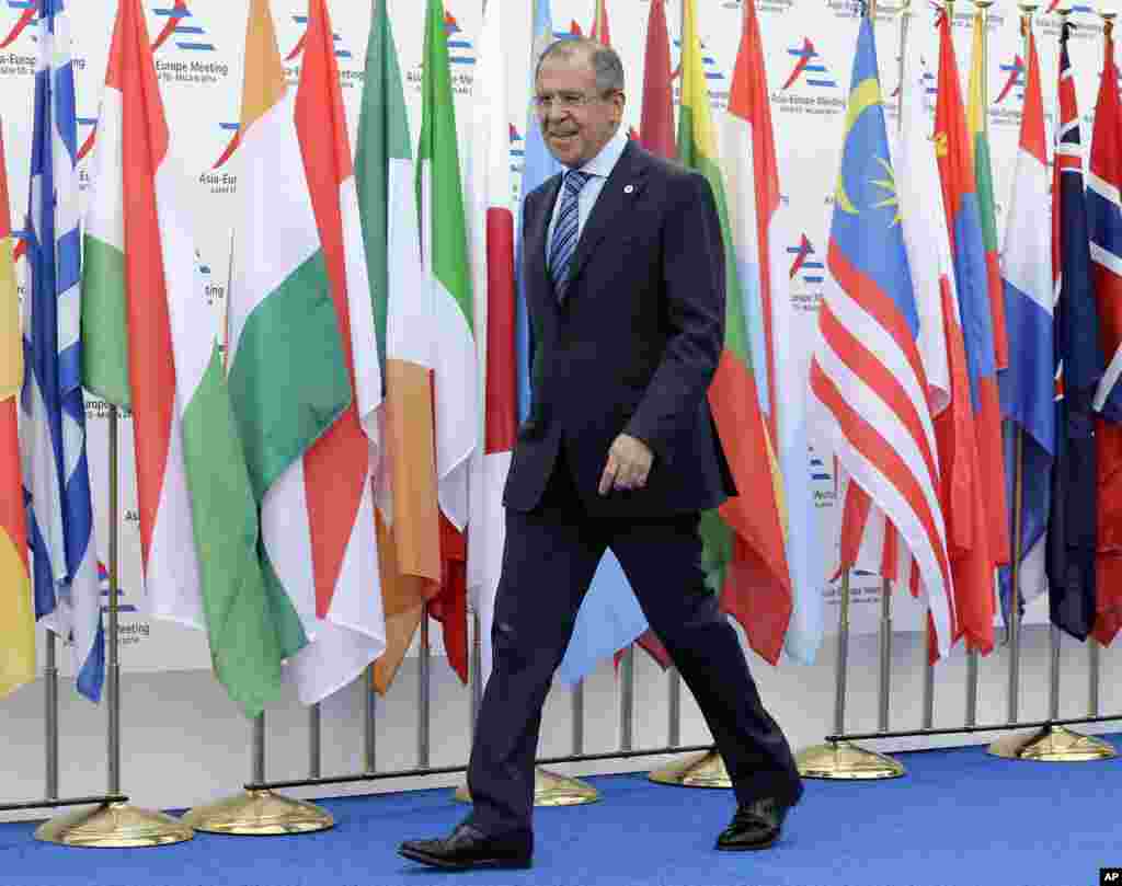 Russian Foreign Minister Sergej Lavrov arrives at the 10th Asia-Europe Meeting (ASEM) while Russian President Vladimir Putin (unseen) is mounting a diplomatic blitz on the sidelines of the summit, in Milan, Italy, Oct. 16, 2014.