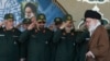 FILE - Supreme Leader Ayatollah Ali Khamenei (R) arriving at a graduation ceremony of the Revolutionary Guard's officers.