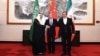 Wang Yi, diplomat senior China (tengah), Ali Shamkhani, Sekretaris Dewan Keamanan Nasional Tertinggi Iran dan Menteri Negara (kanan) dan Penasihat Keamanan Nasional Arab Saudi Musaad bin Mohammed Al Aiban dalam pertemuan di Beijing, China, 10 Maret 2023. 