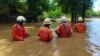 ပျော်ဘွယ်မြို့ရေဘေး အကူအညီပေးနတေဲ့ အရန်မီးသတ်တပ်ဖွဲ့များ (ဓာတ်ပုံ - မြန်မာ့ မီးသတ်ဦးစီးဌာန) 
