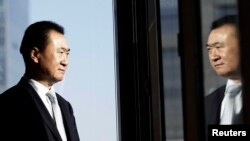 Wang Jianlin, chairman of Dalian Wanda Group and China's richest person, poses for a photo during an interview at his office in Beijing in this December 3, 2012, file photo.