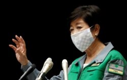 Tokyo Governor Yuriko Koike gestures as she attends a news conference in Tokyo, Japan, July 10, 2020.